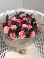 50 Mix pink roses with leaves.